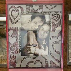 NEW Brushed nickel heart cut out frame.